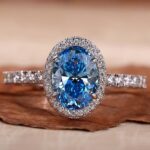 Blue Majesty 1.5 Carat Oval Fancy Blue Halo Engagement Ring Blue Majesty Oval Halo Diamond Engagement Ring – View 1