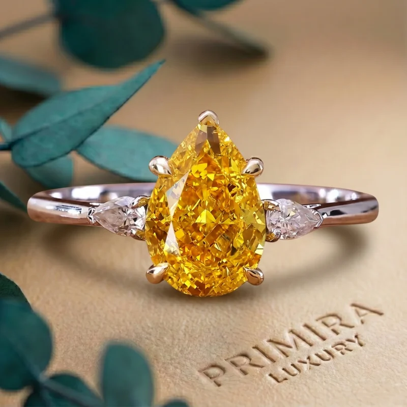 Golden Elegance 1.5 Carat Pear Cut Vivid Yellow Diamond Trio Ring
