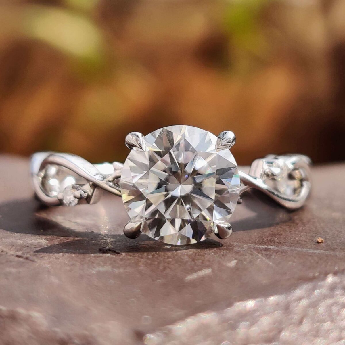 Infinity Twist Round Moissanite Engagement Ring – View 1