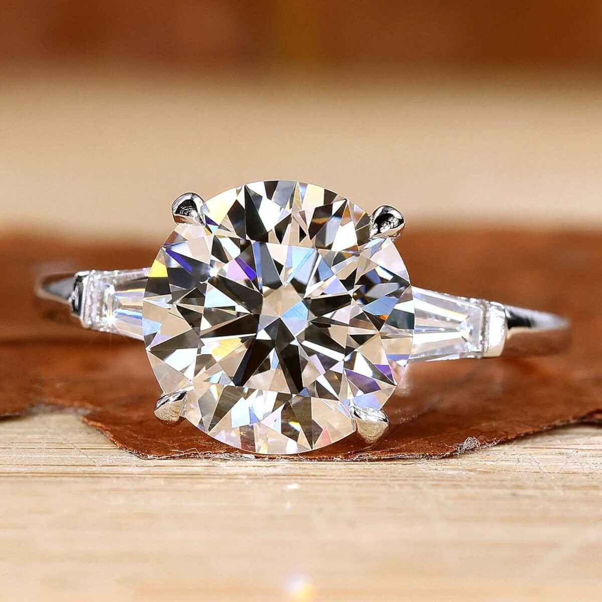 Pure Radiance Round Three-Stone Ring – View 1