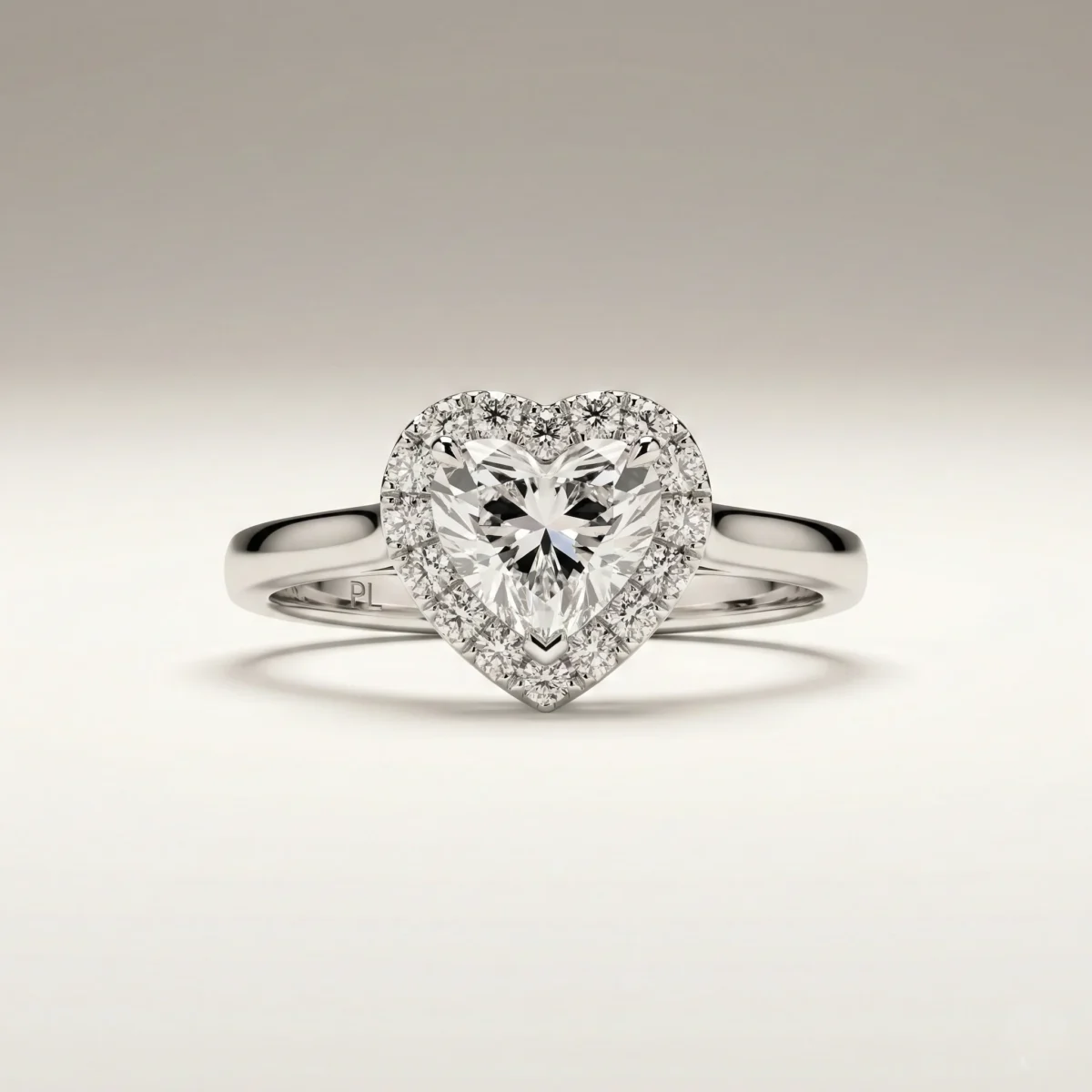 Heart halo 0.50 ct lab grown diamond engagement ring in white gold with raised halo basket and slim comfort-fit band.