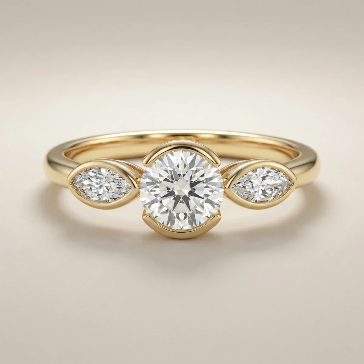 Round lab grown diamond three-stone engagement ring with marquise side stones in yellow gold, 1.0 carat center diamond design