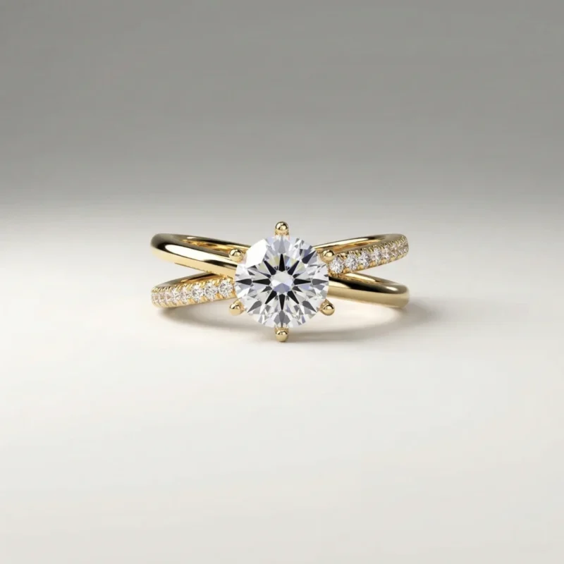 1.0 carat round brilliant lab grown diamond crossover pavé engagement ring in yellow gold with six-prong solitaire setting.