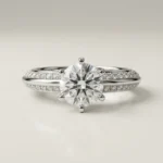 Round pavé shoulder 1 carat lab grown diamond engagement ring in white gold with elevated four-prong solitaire setting