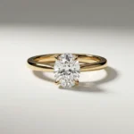 1 carat oval lab grown diamond four-prong solitaire engagement ring in yellow gold